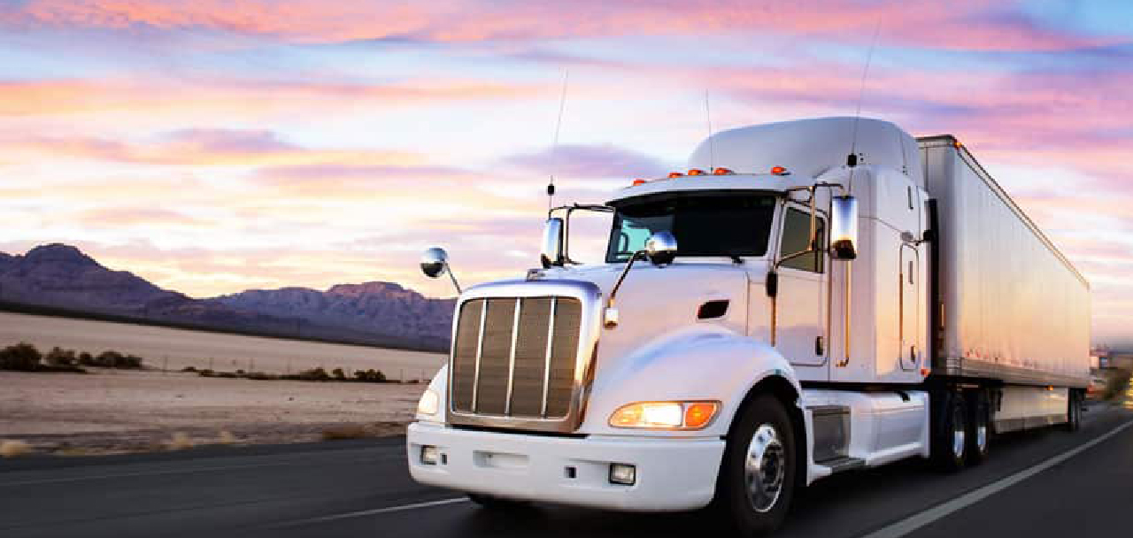 semi truck driving on road